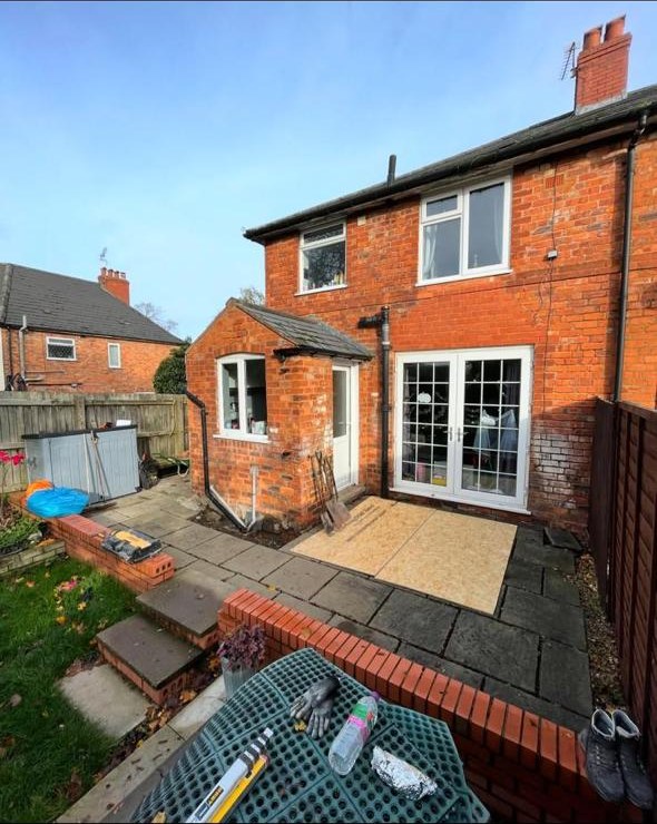 Rear of brick house before extension work began