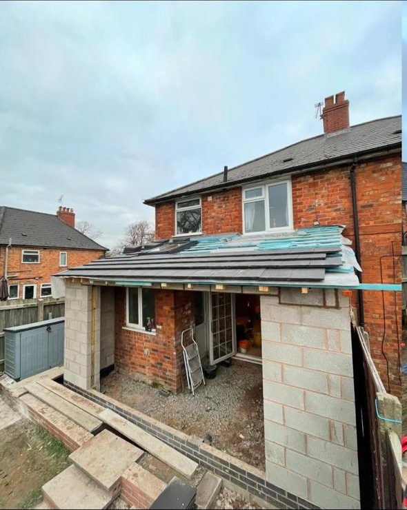New extension roof being tiled